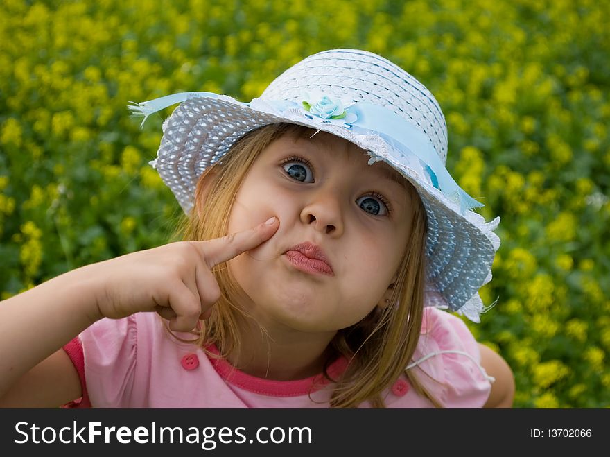 The ridiculous girl in a blue hat. The ridiculous girl in a blue hat.