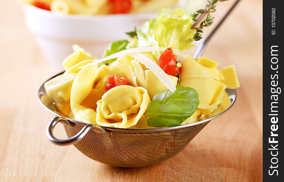 Stuffed pasta in a sieve - detail. Stuffed pasta in a sieve - detail