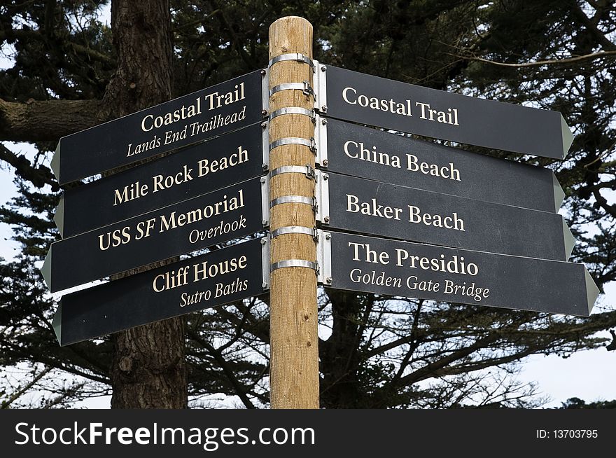 Directional signpost on coastal trail in San Francisco