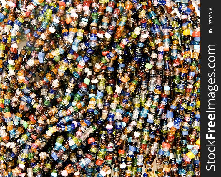 Lot of threads of multi-coloured beads. Lot of threads of multi-coloured beads