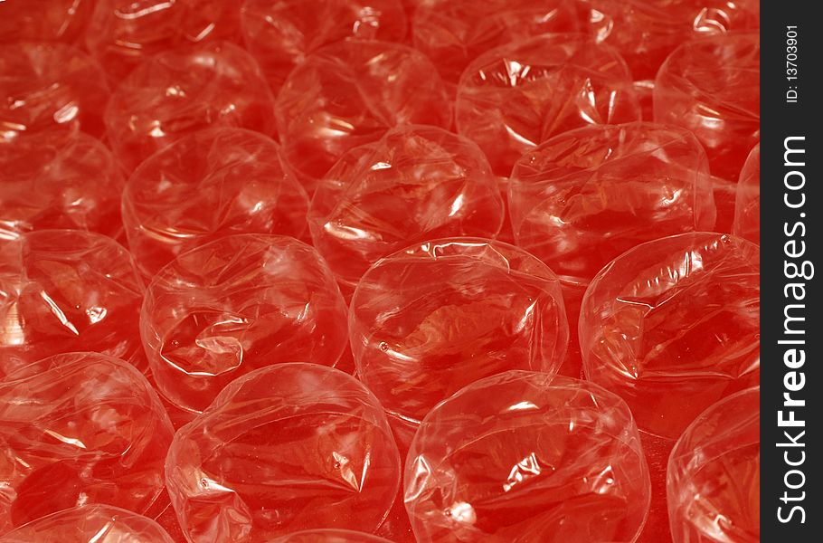 Giant Bubble Wrap Bubbles on a Red Background