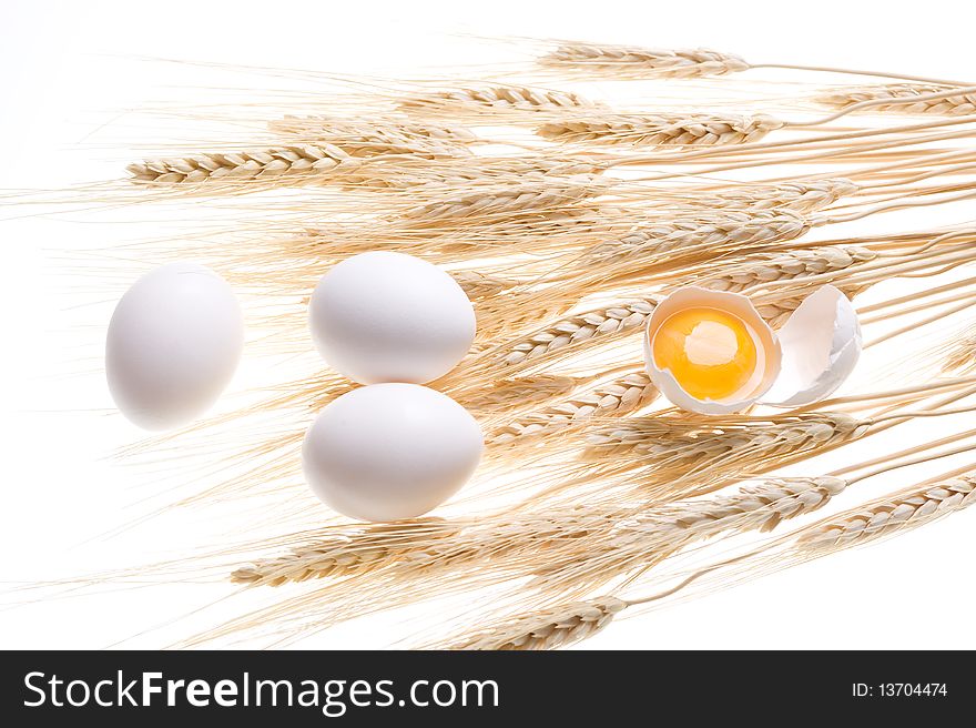 Background with gold wheat and egg