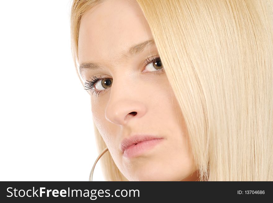 Blonde girl with beautiful hair and soft skin