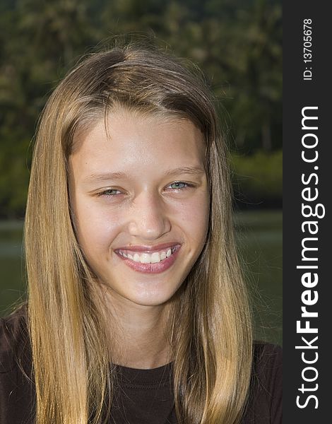 Closeup portrait of charming young girl smiling. Closeup portrait of charming young girl smiling