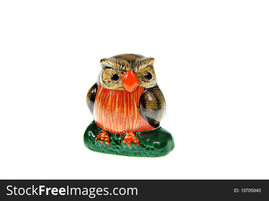 Isolated wooden brown owl trinket