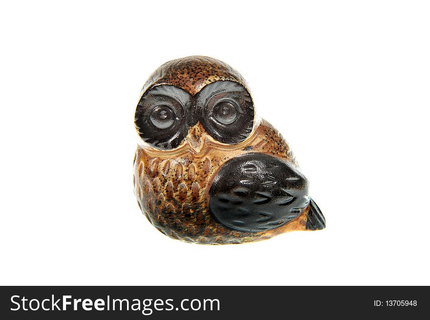 Isolated wooden brown owl trinket