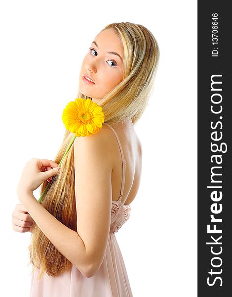 Young woman with a flower. Over white background