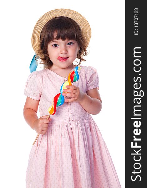 Little girl with lollipop studio shot