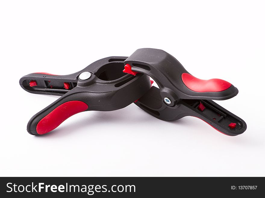 Professional clamps over white background