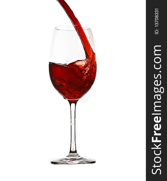 Pouring red wine isolated on white