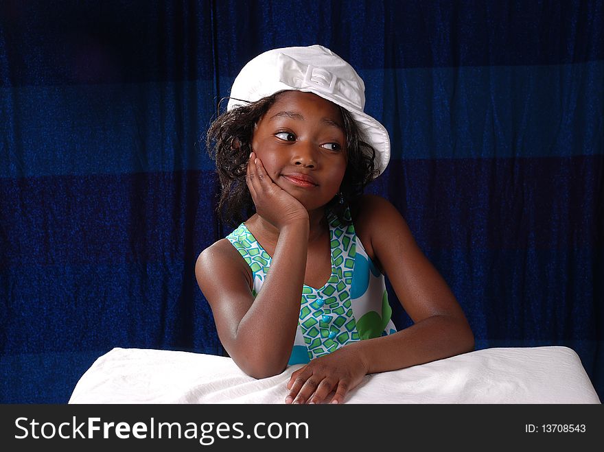 Young black child 6 years old posiing for a pageant contest. Young black child 6 years old posiing for a pageant contest
