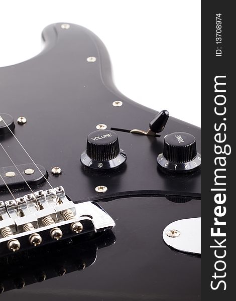 Black electric guitar on white background. Black electric guitar on white background