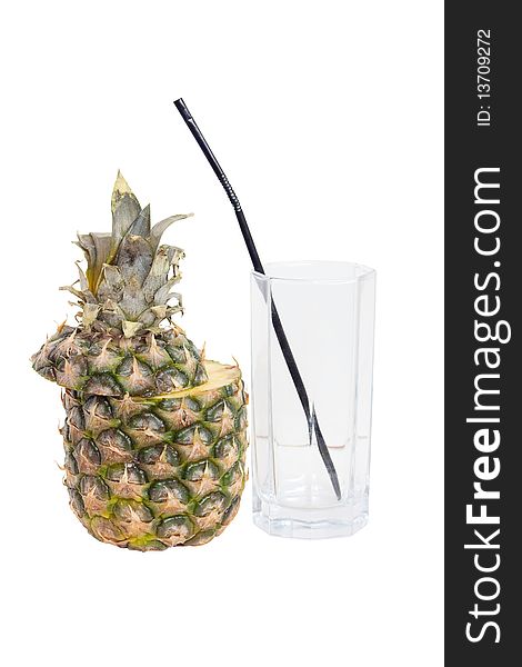 Sliced pineapple and an empty glass tube, isolated on a white background. Sliced pineapple and an empty glass tube, isolated on a white background.