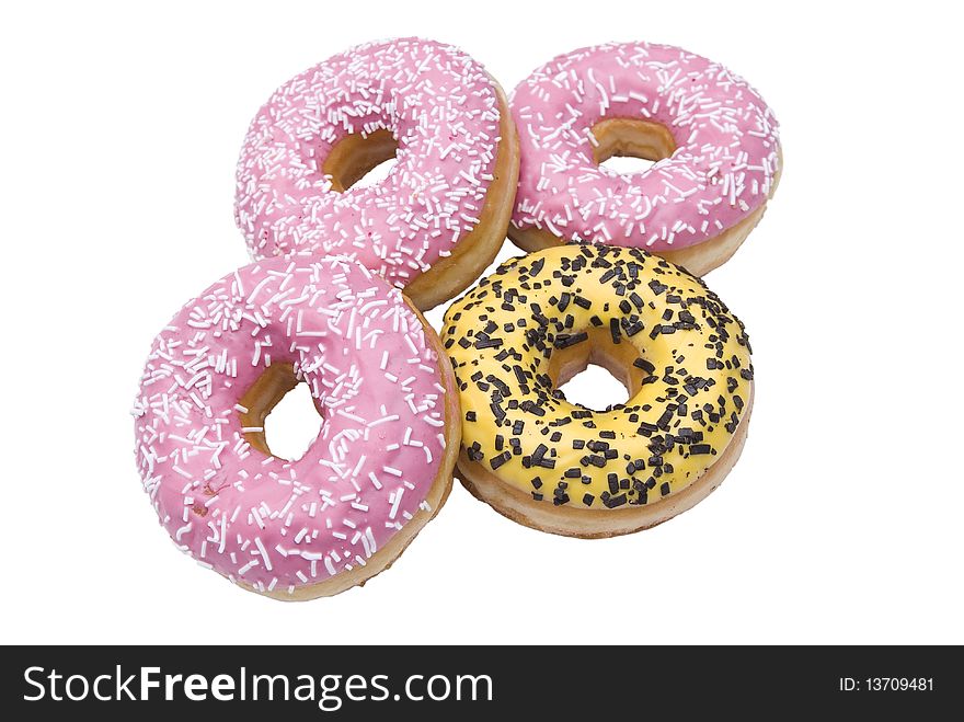 Four isolated doughnuts on white background