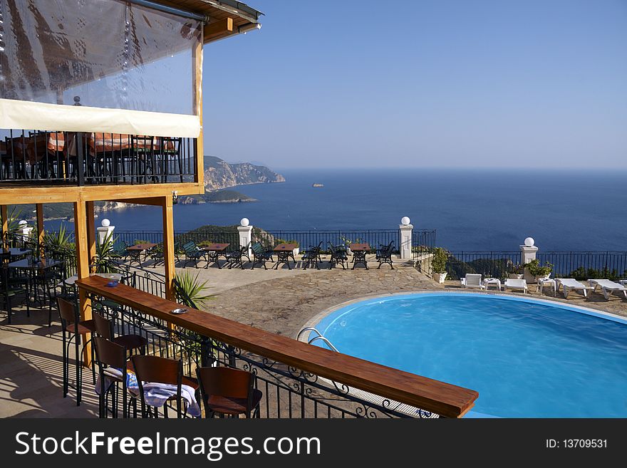 Swimming pool with ocean and mountain view