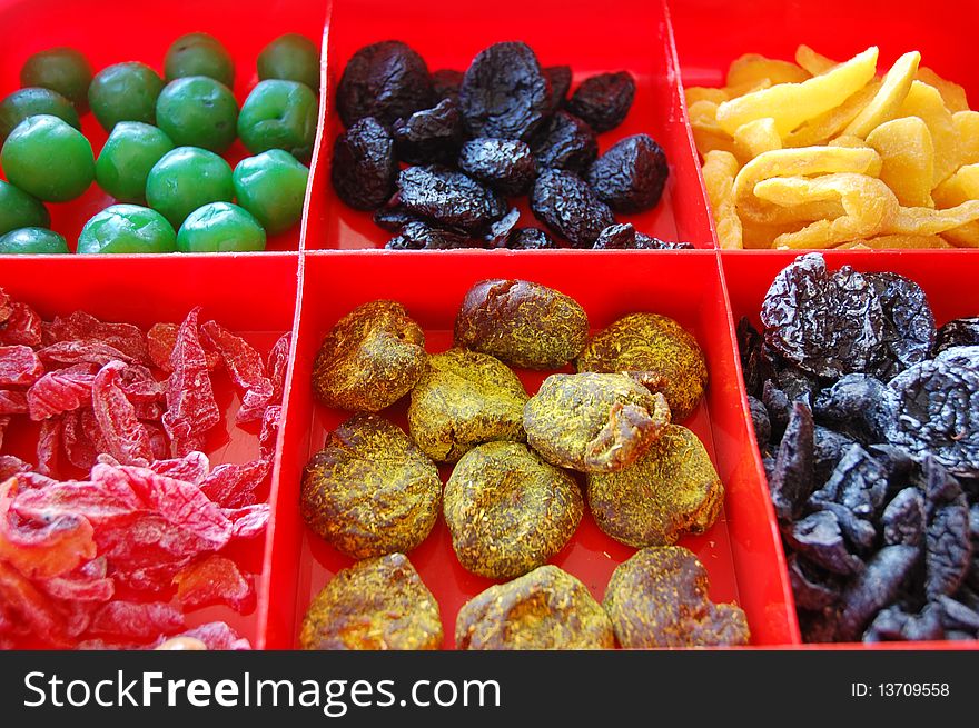 Close up of few snacks with red mug