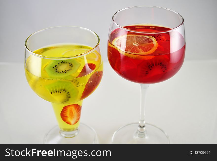 Fruit colored jello in a glass