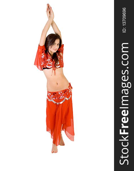 Pretty girl belly dancing in studio