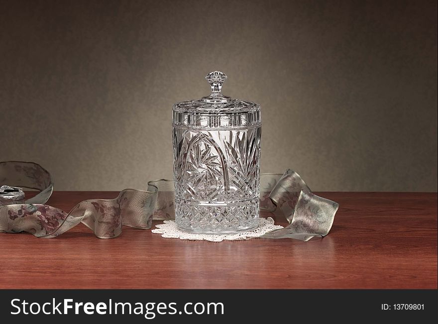 Crystal Dish On Wood Table Surface