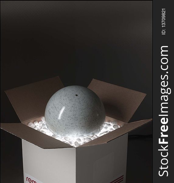 Globe sits inside of an illuminated cardboard box with popcorn for packaging. Globe sits inside of an illuminated cardboard box with popcorn for packaging