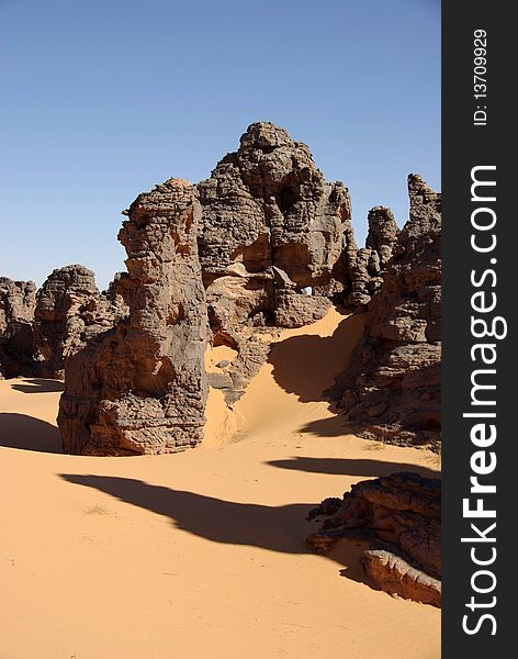 Sandstone peaks in the desert of Libya, in Africa. Sandstone peaks in the desert of Libya, in Africa