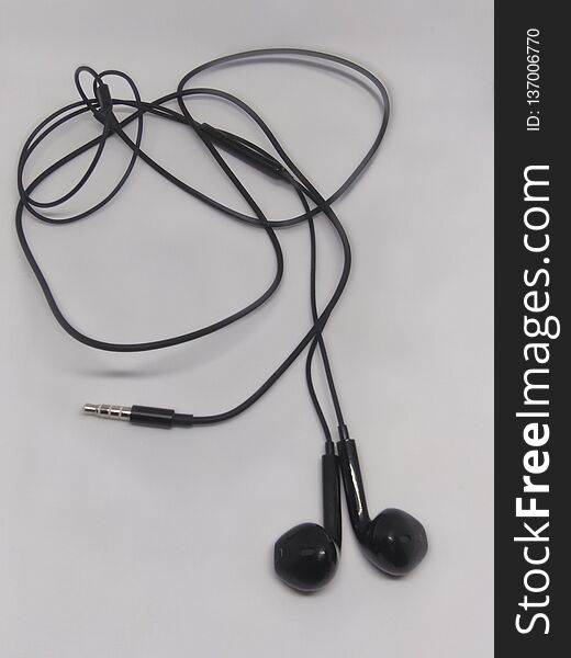 Headset Of Mobile Phone In White Background