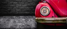 Front View Of Detail Headlight Old Red Car In Dark Garage Background Stock Photography