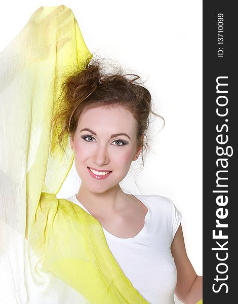 Young happy woman with yellow scarf over white