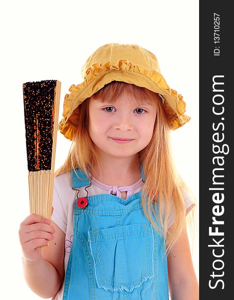 Nice girl in blue suit is playing with a fan on white background. Nice girl in blue suit is playing with a fan on white background