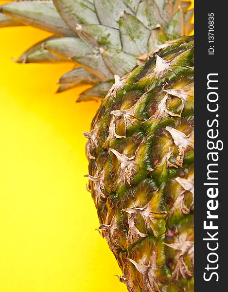 Pineapple on a vibrant yellow background. Pineapple on a vibrant yellow background.