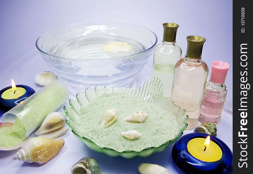 Spa lit candles bathing salt sea shells and essences. Spa lit candles bathing salt sea shells and essences