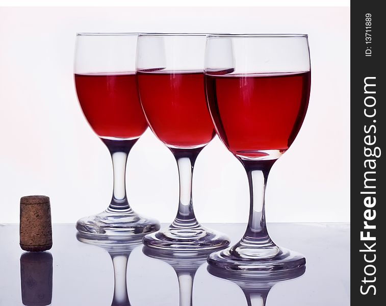 Three glasses of red wine