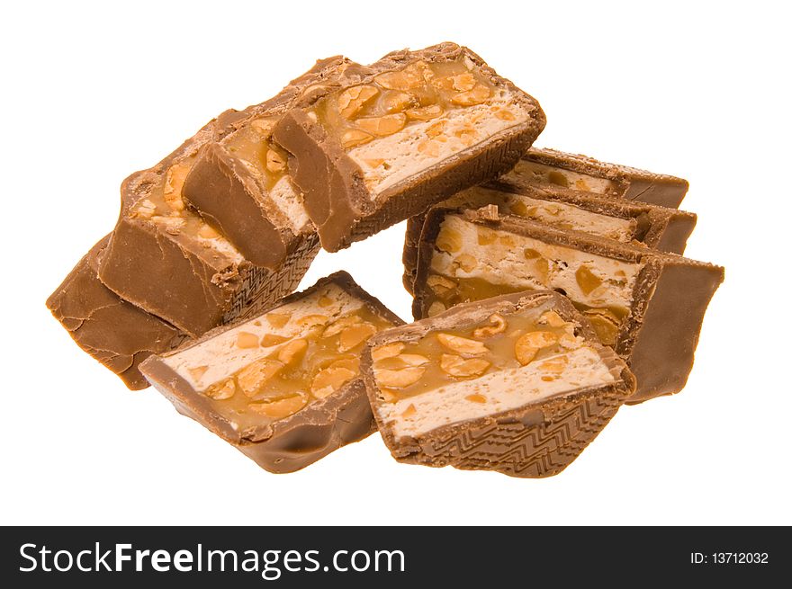 Very delicious candy made with honey condensed milk and peanut chocolate on white background. Very delicious candy made with honey condensed milk and peanut chocolate on white background