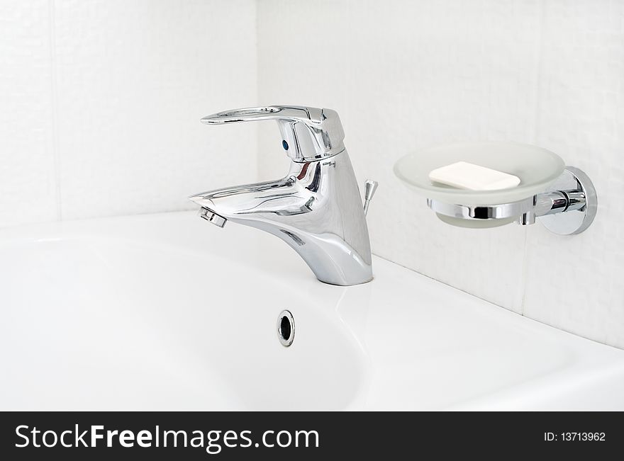 One Chrome Faucet With Soap Holder