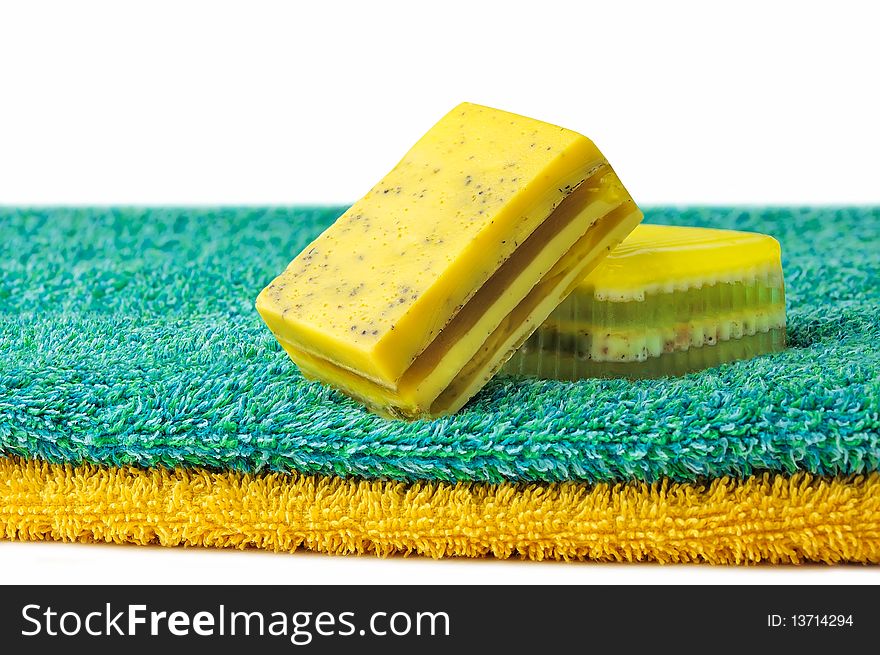 Pieces of handmade soap over white background