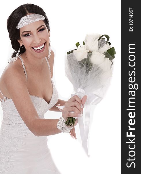 Bride throwing bouquet over white background. Bride throwing bouquet over white background