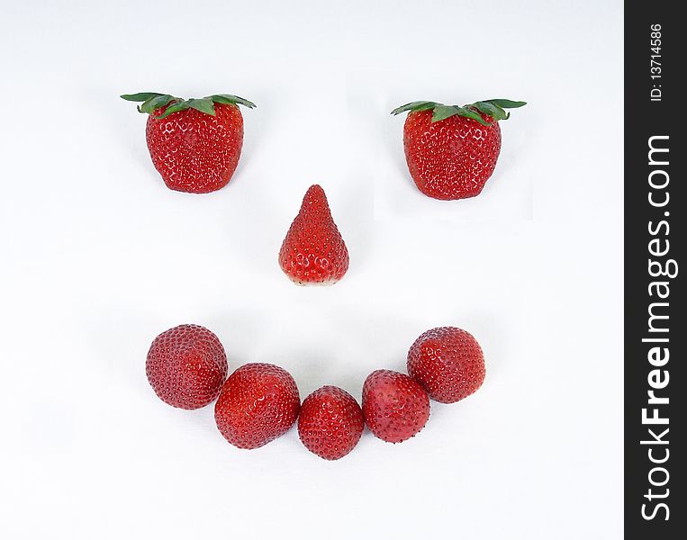 Strawberies made into smiley face. Strawberies made into smiley face