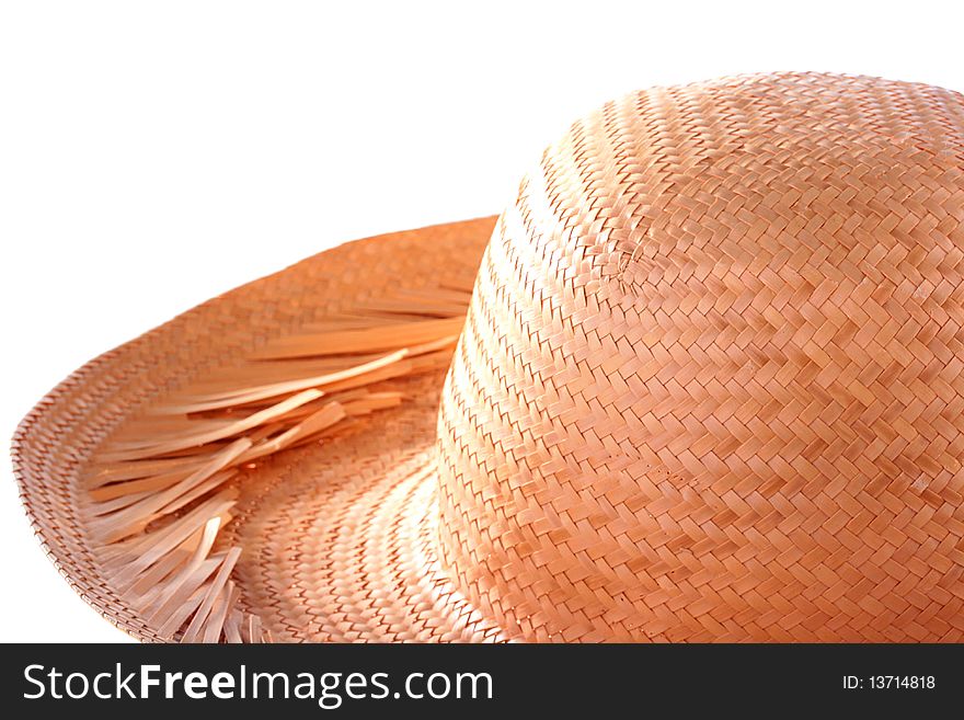 Straw hat from the sun for work in a garden or rest on a beach.