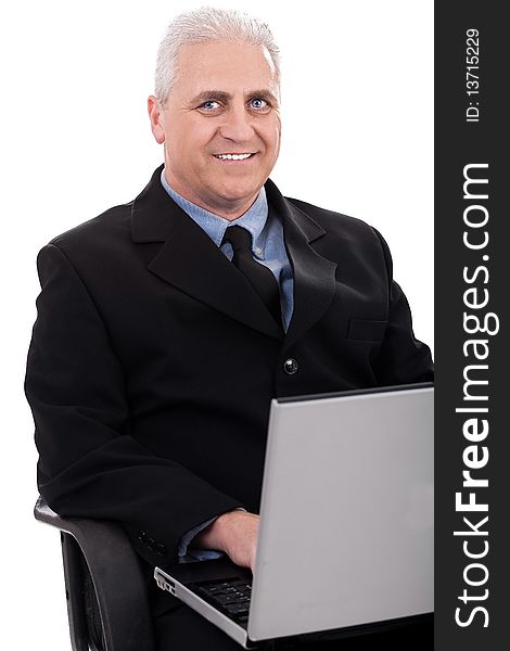 Mature business man working in notebook on white background