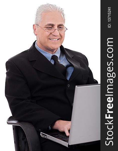 Mature business man in working with laptop on white background
