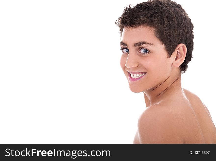 Topless young teenager smiling on white background