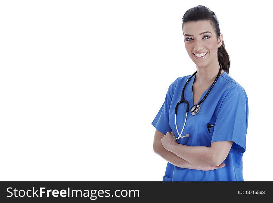 Young confident nurse posing at the camera on isolated white background