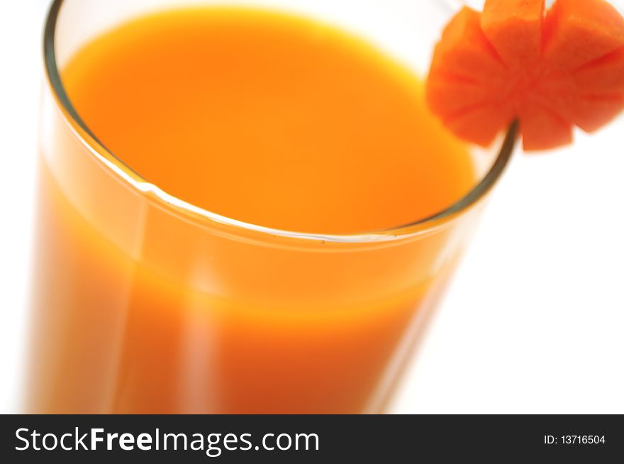 A glass of freshly squeezed carrot juice