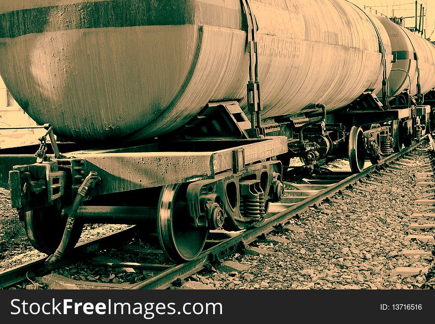 Old railway tank car parked on the tracks