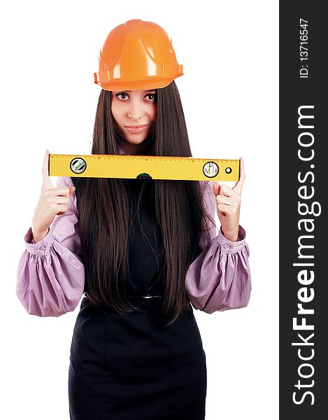 Charming young businesswoman builder orange helmet is isolated on a white background. Charming young businesswoman builder orange helmet is isolated on a white background