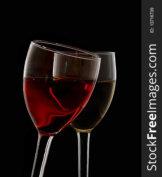 Two glasses with red and white wine