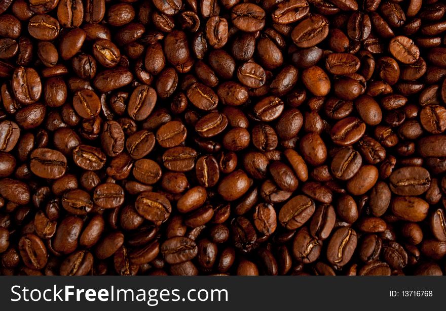 Lot of coffee beans background.