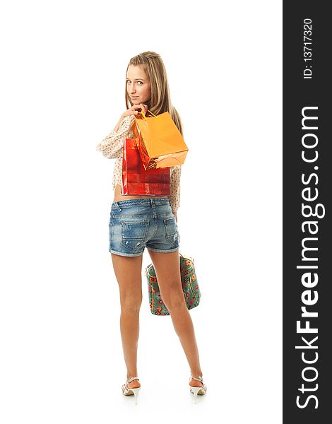 The young beautiful girl with a bags isolated on a white background