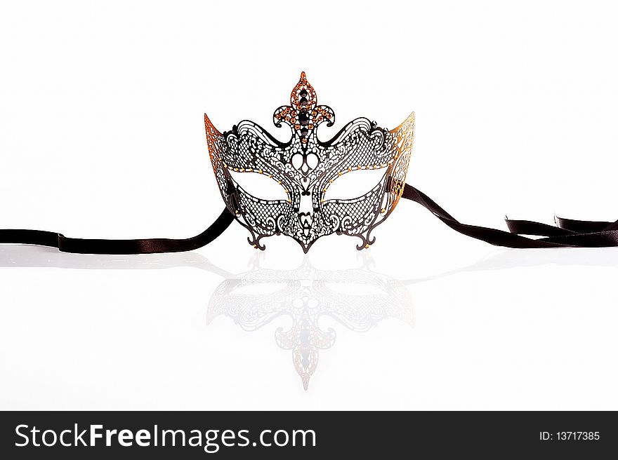 Elegant black venetian mask isolated on white. Elegant black venetian mask isolated on white