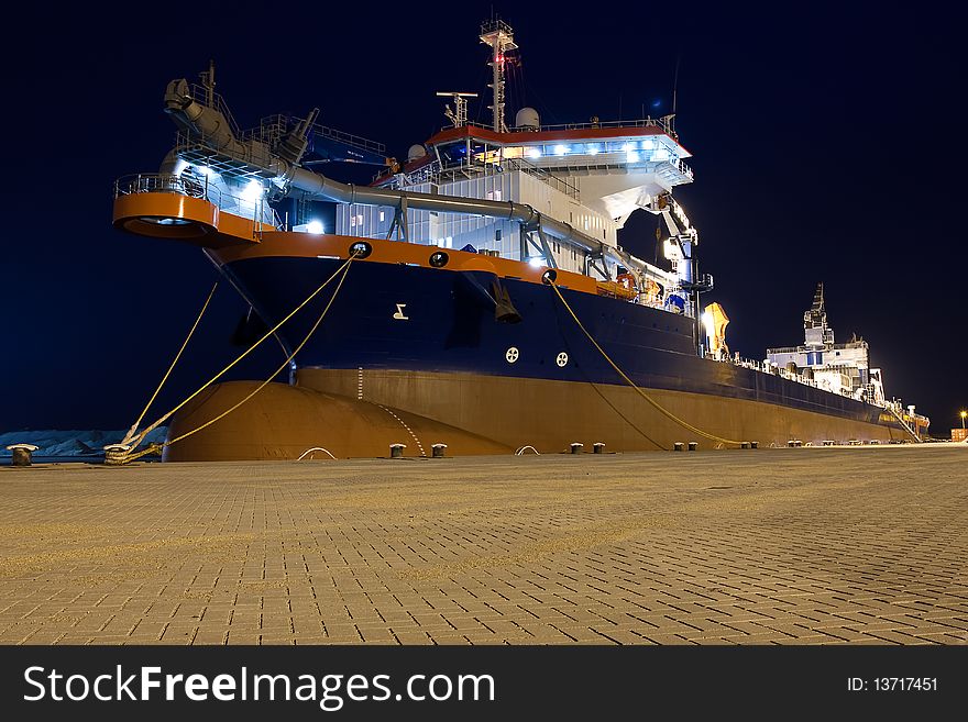 A trailing suction hopper dredger. A trailing suction hopper dredger